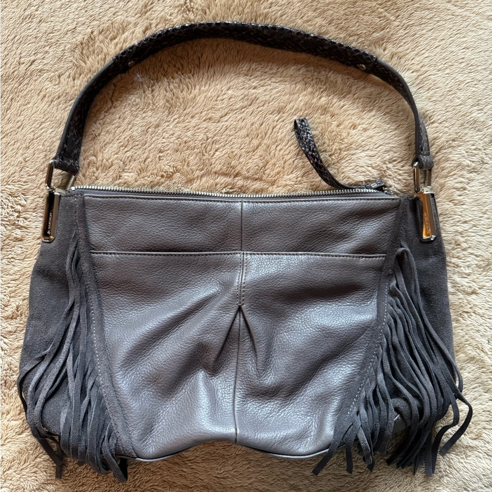 B Makowski pebble leather shoulder bag. Charcoal with fringe.